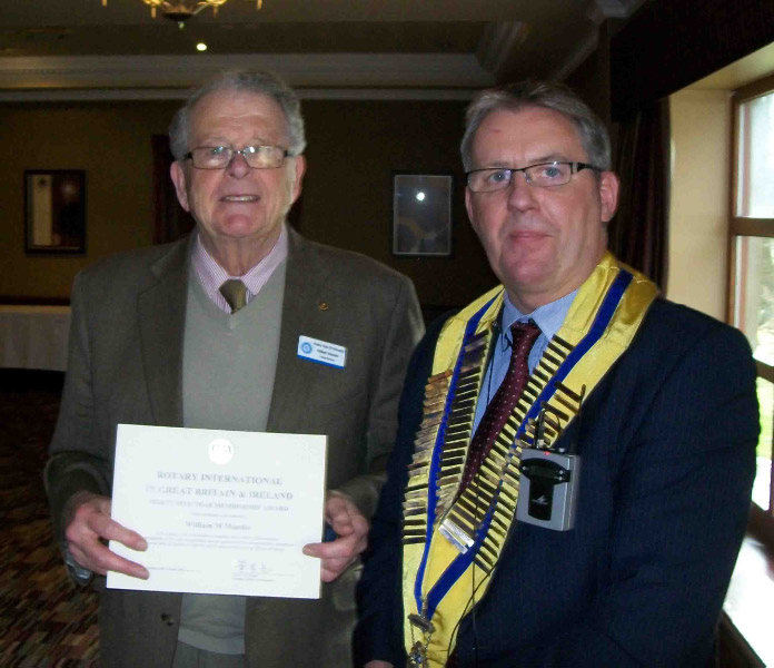 President Brian presents PDG Bill with his Sapphire & Long Service Certificate